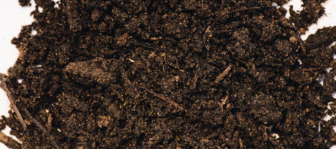Top soil material used to prepare planting beds and lawns